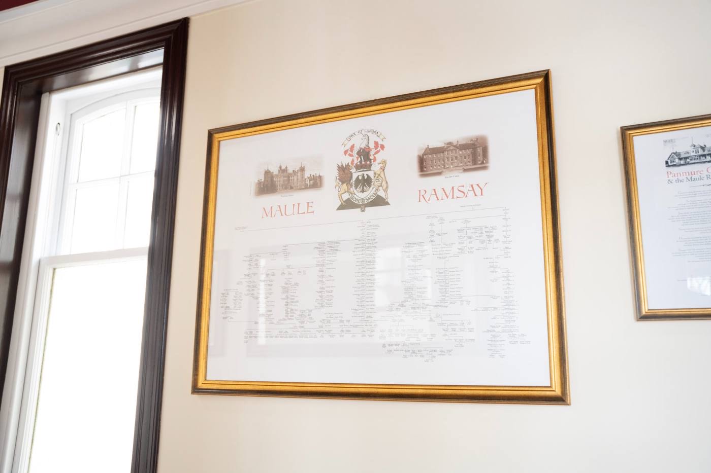 A framed heraldic genealogy chart headed MAULE and RAMSAY, with coats of arms and engravings of two houses
